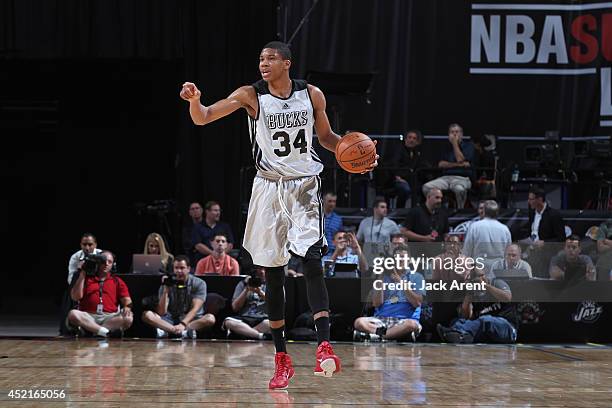 Giannis Antetokounmpo of the Milwaukee Bucks controls the ball against the Utah Jazz at the Samsung NBA Summer League 2014 on July 14, 2014 at the...