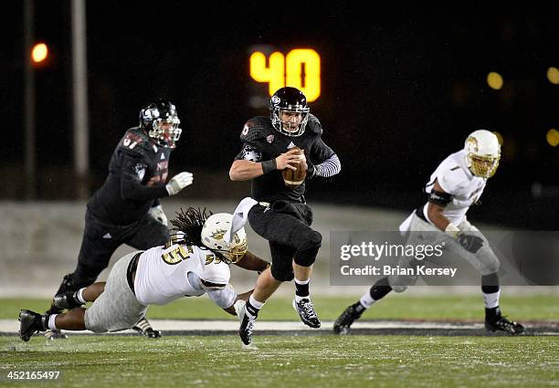 Quarterback Jordan Lynch of the Northern Illinois Huskies runs for 36 yards and a touchdown during the second quarter against the Western Michigan...