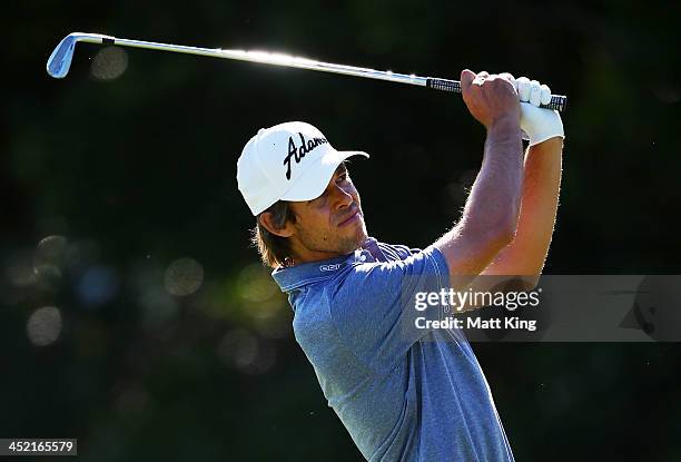 Aaron Baddeley of Australia plays a fairway shot during practice ahead of the 2013 Australian Open at Royal Sydney Golf Club on November 27, 2013 in...