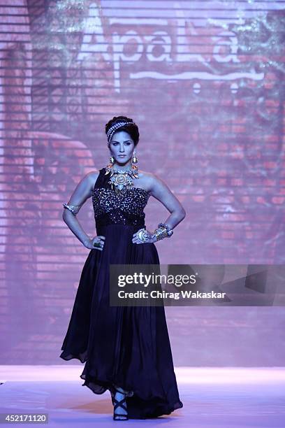 Sunny Leone walks the runway at the Apala show during day 1 of the India International Jewellery Week 2014 at grand Hyatt on July 14, 2014 in Mumbai,...