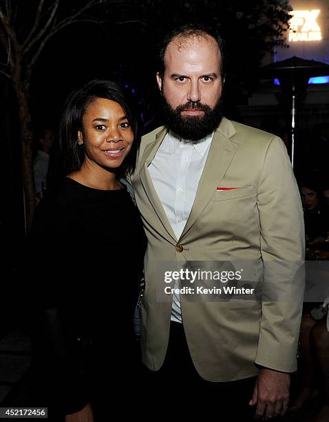 Actress Regina Hall and actor Brett Gelman pose at the after party for the premiere screening's of FX Network's "You're The Worst" and "Married" at...
