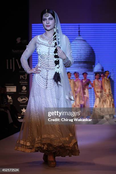 Ankita Shorey walks the runway at Gitanjali Gems show during day 1 of the India International Jewellery Week 2014 at grand Hyatt on July 14, 2014 in...