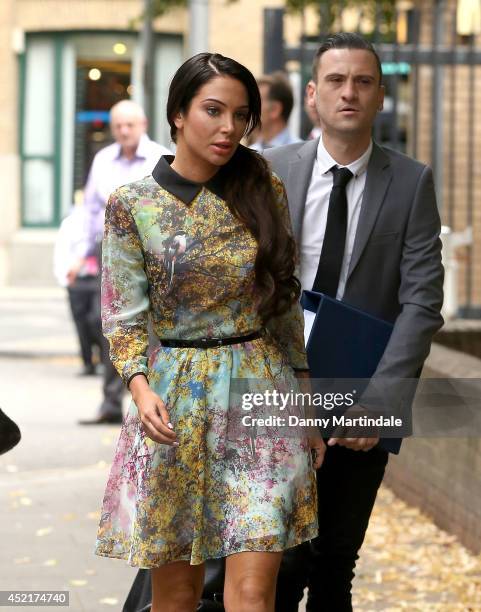 Tulisa Contostavlos arrives at court to face drug charges at Southwark Crown Court on July 14, 2014 in London, England.