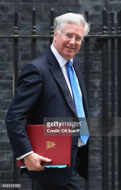 Michael Fallon, the new Defence Secretary departs Downing Street on July 15, 2014 in London, England. British Prime Minister David Cameron is...