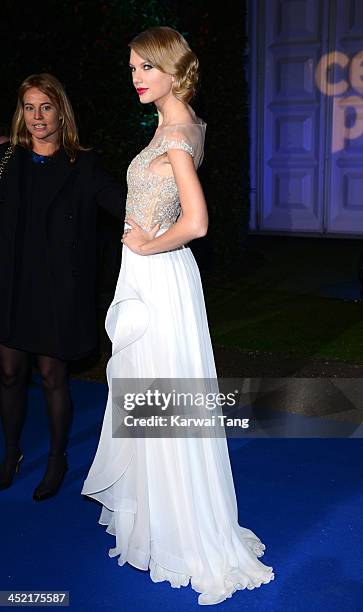 Taylor Swift attends the Winter Whites Gala in aid of Centrepoint at Kensington Palace on November 26, 2013 in London, England.