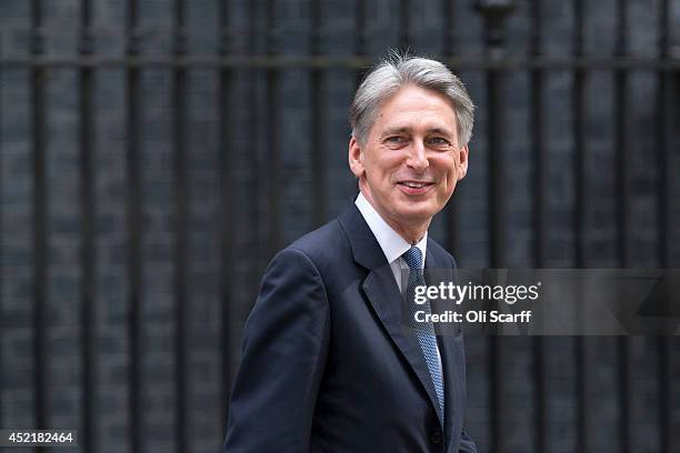 Philip Hammond, the Foreign Secretary, leaves Downing Street on July 15, 2014 in London, England. British Prime Minister David Cameron is conducting...