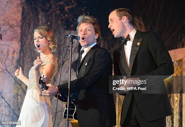 Taylor Swift, Jon Bon Jovi and Prince William, Duke of Cambridge sing on stage at the Centrepoint Gala Dinner at Kensington Palace on November 26,...