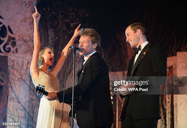 Taylor Swift, Jon Bon Jovi and Prince William, Duke of Cambridge sing on stage at the Centrepoint Gala Dinner at Kensington Palace on November 26,...