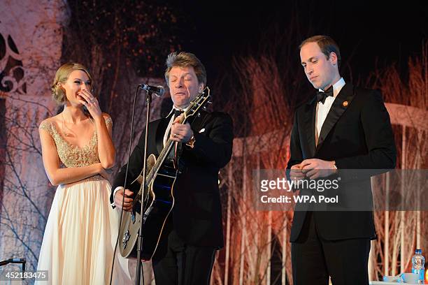 Taylor Swift, Jon Bon Jovi and Prince William, Duke of Cambridge sing on stage at the Centrepoint Gala Dinner at Kensington Palace on November 26,...