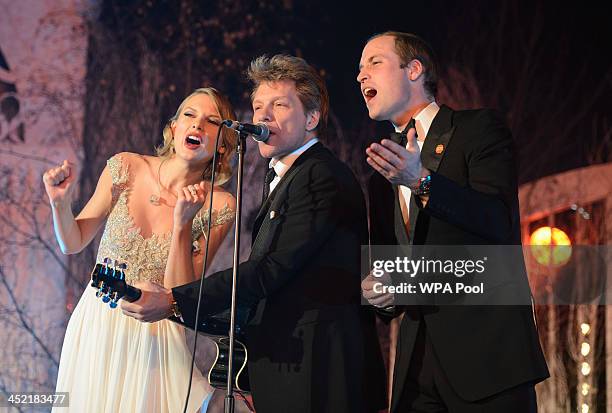 Taylor Swift, Jon Bon Jovi and Prince William, Duke of Cambridge sing on stage at the Centrepoint Gala Dinner at Kensington Palace on November 26,...