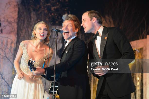 Taylor Swift, Jon Bon Jovi and Prince William, Duke of Cambridge sing on stage at the Centrepoint Gala Dinner at Kensington Palace on November 26,...