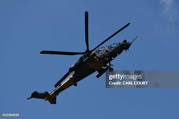 Atak helicopter is pictured during an air display on the second day of the Farnborough International Air show in Hampshire, England, on July 15,...