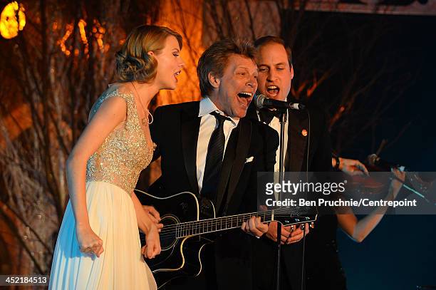 Taylor Swift, Jon Bon Jovi and Prince William, Duke of Cambridge perform during the Winter Whites Gala In Aid Of Centrepoint on November 26, 2013 in...