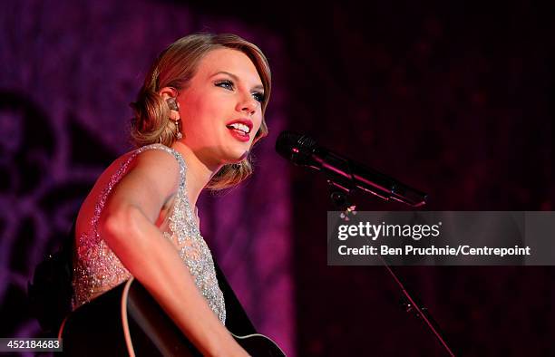Taylor Swift performs during the Winter Whites Gala In Aid Of Centrepoint on November 26, 2013 in London, England.
