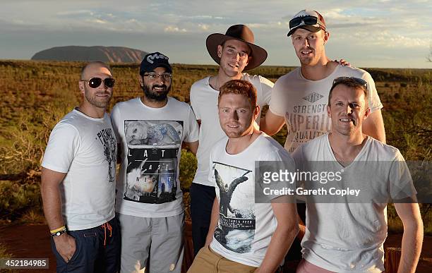 England cricketers Matt Prior, Monty Panesar, Stuart Broad, Jonathan Bairstow, Boyd Rankin and Graeme Swann pose for a photograph during a team visit...