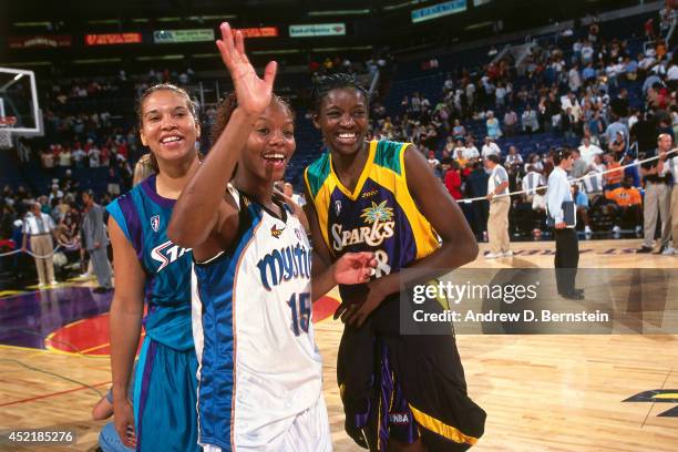 Nikki McCray of the Eastern Conference All-Stars waves during the 2000 WNBA All-Star Game on July 17, 2000 at America West Arena in Phoenix, Arizona....