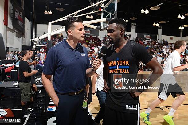 Tim Hardaway Jr. #5 of the New York Knicks speaks witht he media during the Samsung NBA Summer League 2014 at the Cox Pavilion on July 14, 2014 in...