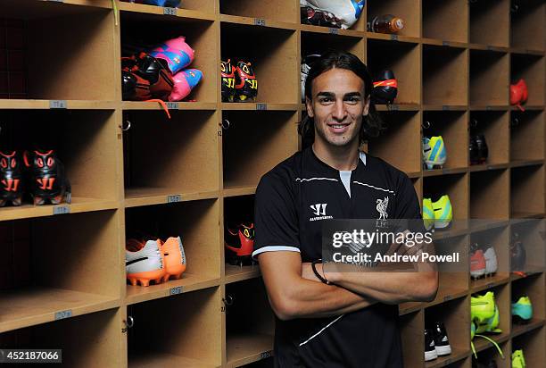 Lazar Markovic poses as he is unveiled as a new signing for Liverpool Football Club at Melwood Training Ground on July 15, 2014 in Liverpool, England.