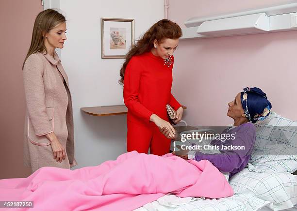 Queen Letizia of Spain and Princess Lalla Salma of Morocco meet a cancer patient during a visit to Lalla Salma Centre for Research Against Cancer on...