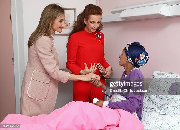 Queen Letizia of Spain and Princess Lalla Salma of Morocco meet a cancer patient during a visit to Lalla Salma Centre for Research Against Cancer on...