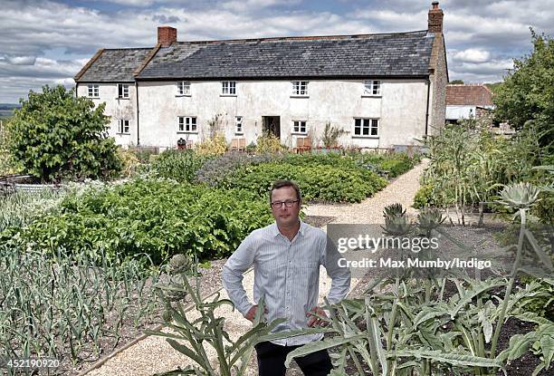 Hugh Fearnley-Whittingstall stands in the vegetable garden of River Cottage HQ following a visit by Prince Charles, Prince of Wales and Camilla,...