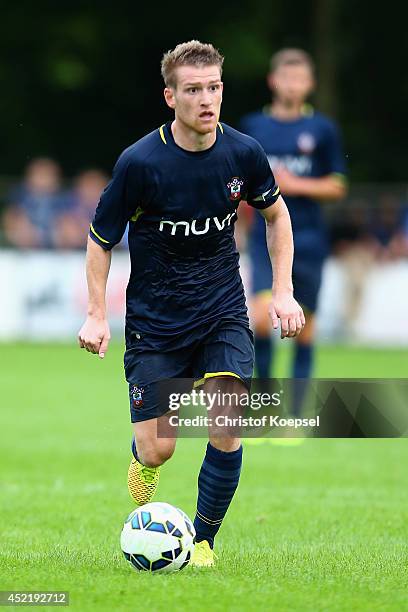 Steven Davis of Southampton runs with the ball during the pre season friendly match between EHC Hoensbroek and Southampton at Sportpark De Dem on...