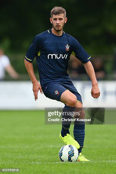 Jack Stephens of Southampton runs with the ball during the pre season friendly match between EHC Hoensbroek and Southampton at Sportpark De Dem on...