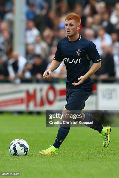 Harrison Reed of Southampton runs with the ball during the pre season friendly match between EHC Hoensbroek and Southampton at Sportpark De Dem on...