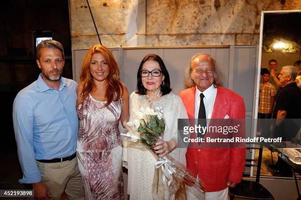 Andreas Kapsalis and his wife Helena Paparizou, Nana Mouskouri and her husband Andre Chapelle pose after the 'Nana Mouskouri Birthday Tour' In Herod...