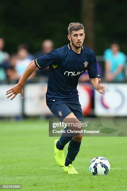 Jack Stephens of Southampton runs with the ball during the pre season friendly match between EHC Hoensbroek and Southampton at Sportpark De Dem on...