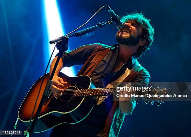 Quique Gonzalez performs on stage at the Jardines del Real on July 15, 2014 in Valencia, Spain.