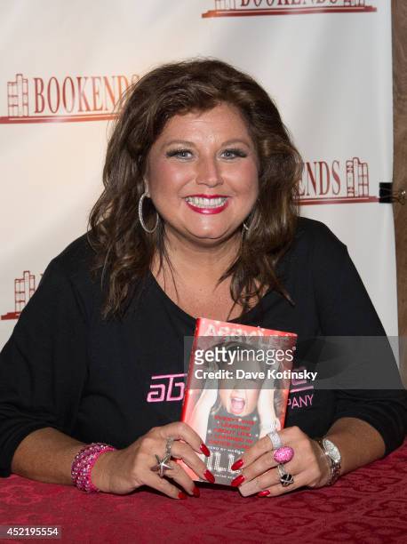 Abby Lee Miller signs copies of her book "Everything I Learned About Life, I Learned From Dance Class" at Bookends Bookstore on July 15, 2014 in...