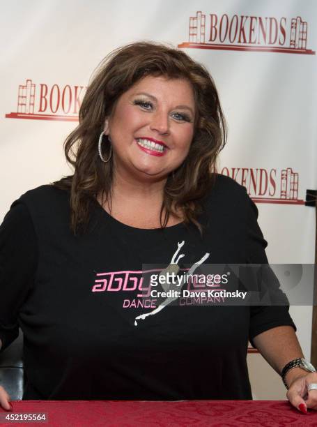 Abby Lee Miller signs copies of her book "Everything I Learned About Life, I Learned From Dance Class" at Bookends Bookstore on July 15, 2014 in...