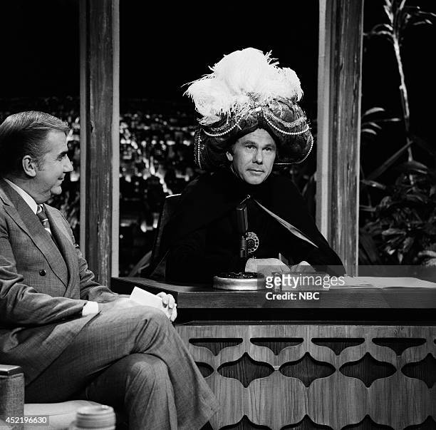 Pictured: Announcer Ed McMahon and host Johnny Carson as Carnac the Magnificent on November 17, 1970 --