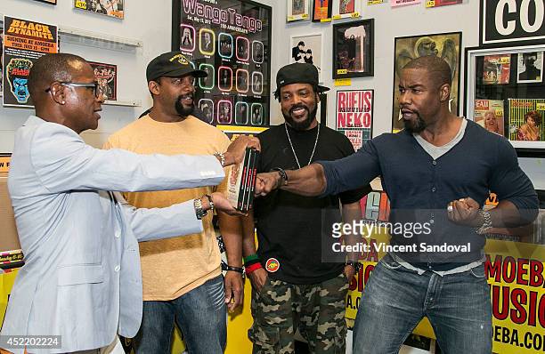 Actor Tommy Davidson, producer Byron Minns, director Carl Jones and producer Michael Jai White attend the "Black Dynamite" DVD signing at Amoeba...