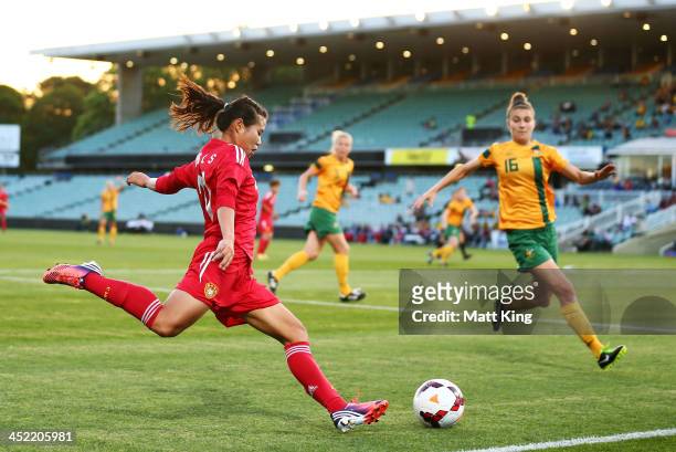 Stephanie Catley of the Matildas defends against Lisi Wang of China during the Women's International Friendly match between the Australian Matildas...