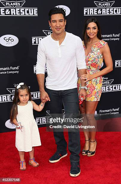 Personality Mario Lopez , daughter Gia Lopez and wife Courtney Mazza attend the premiere of Disney's "Planes: Fire & Rescue" at the El Capitan...