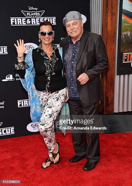 Actor Stacy Keach and his wife Malgosia Tomassi arrive at the Los Angeles premiere of Disney's "Planes: Fire & Rescue" at the El Capitan Theatre on...