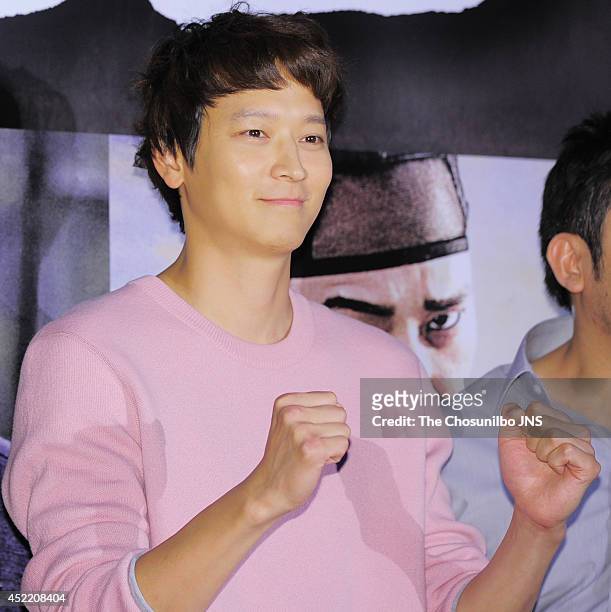 Gang Dong-Won poses for photographs during the movie 'KUNDO : Age of the Rampant' VIP premiere at COEX Megabox on July 14, 2014 in Seoul, South Korea.