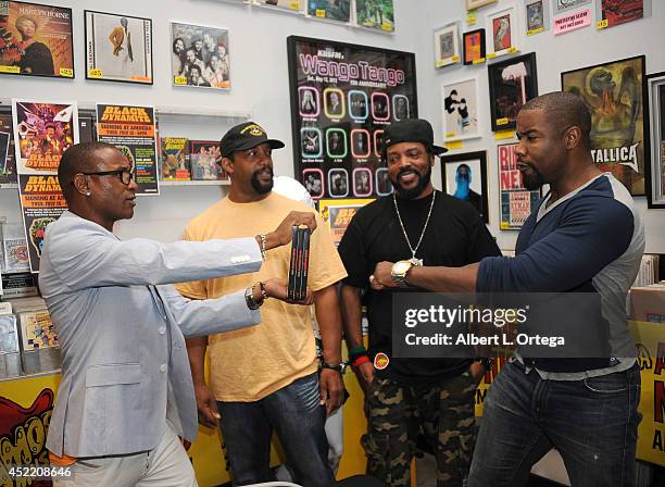 Actor Tommy Davidson, producer Byron Minns, producer Carl Jones and producer Michael Jai White attends the DVD Signing With "Black Dynamite" Cast At...