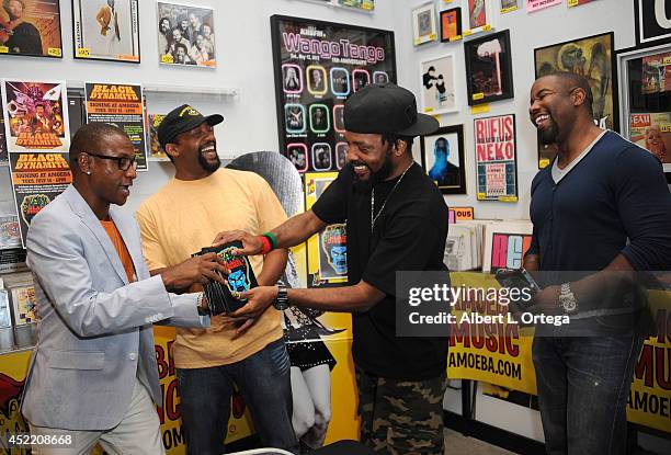 Actor Tommy Davidson, producer Byron Minns, producer Carl Jones and producer Michael Jai White attends the DVD Signing With "Black Dynamite" Cast At...