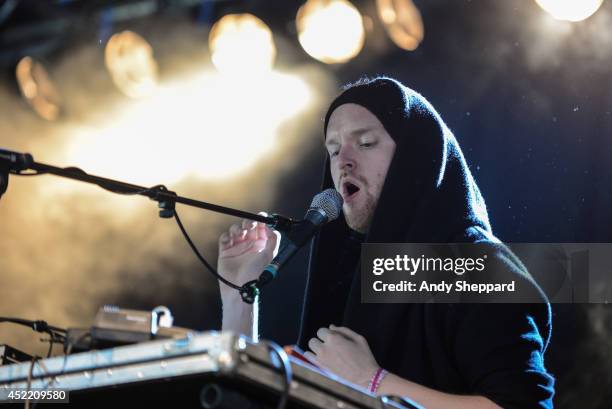 Christopher Taylor aka SOHN performs on stage at Field Day Festival 2014 at Victoria Park on June 7, 2014 in London, United Kingdom.