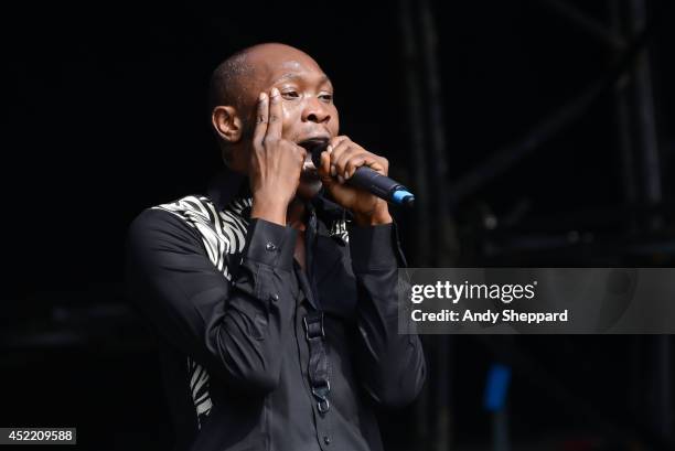 Seun Kuti performs on stage at Field Day Festival 2014 at Victoria Park on June 7, 2014 in London, United Kingdom.