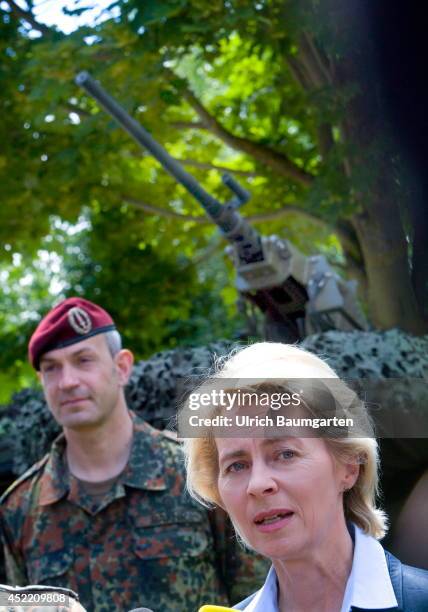 Defence Minister Ursula von der Leyen and Brigade general Dag Baehr, commander of the KSK , during the press conference in Calw. Behind the heads a...