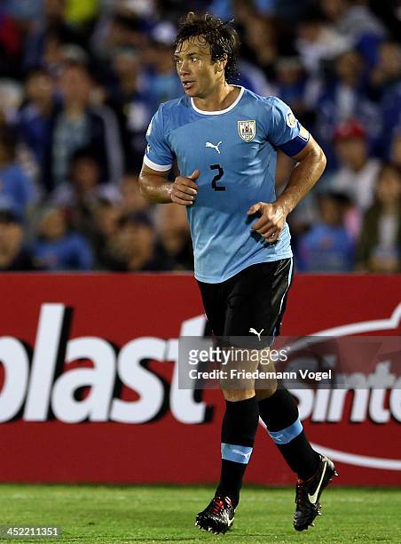 Diego Lugano of Uruguay runs during leg 2 of the FIFA World Cup Qualifier match between Uruguay and Jordan at Centenario Stadium Stadium on November...