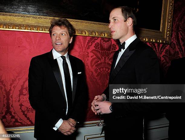 Jon Bon Jovi and Prince William, Duke of Cambridge attend the Winter Whites Gala in aid of Centrepoint at Kensington Palace on November 26, 2013 in...