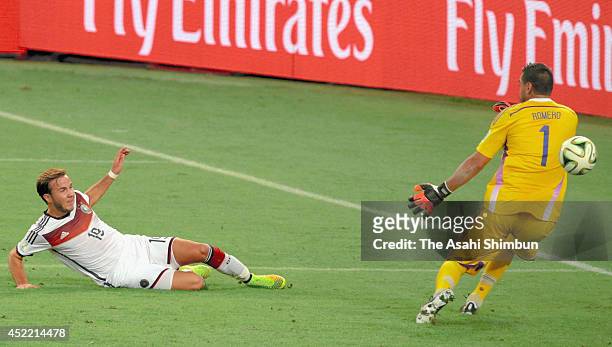Mario Goetze of Germany scores his team's first goal during the 2014 FIFA World Cup Brazil Final match between Germany and Argentina at Maracana on...