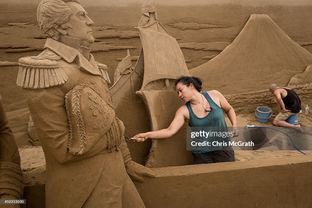 Artists Work On Sand Art Ahead Of "Culture City of East Asia 2014" Exhibition