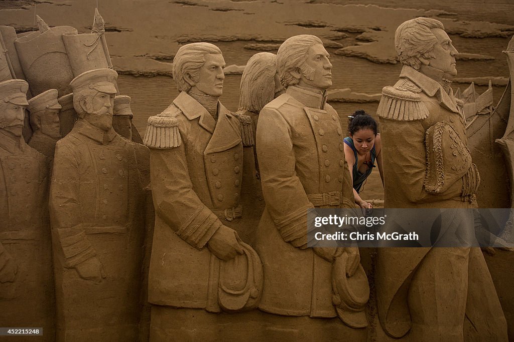 Artists Work On Sand Art Ahead Of "Culture City of East Asia 2014" Exhibition