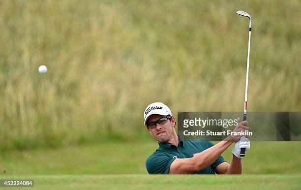 Adam Scott of Australia plays a shot during a practice round prior to the start of The 143rd Open Championship at Royal Liverpool on July 16, 2014 in...